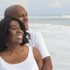 happy-senior-african-american-couple-beach-27757346.jpg